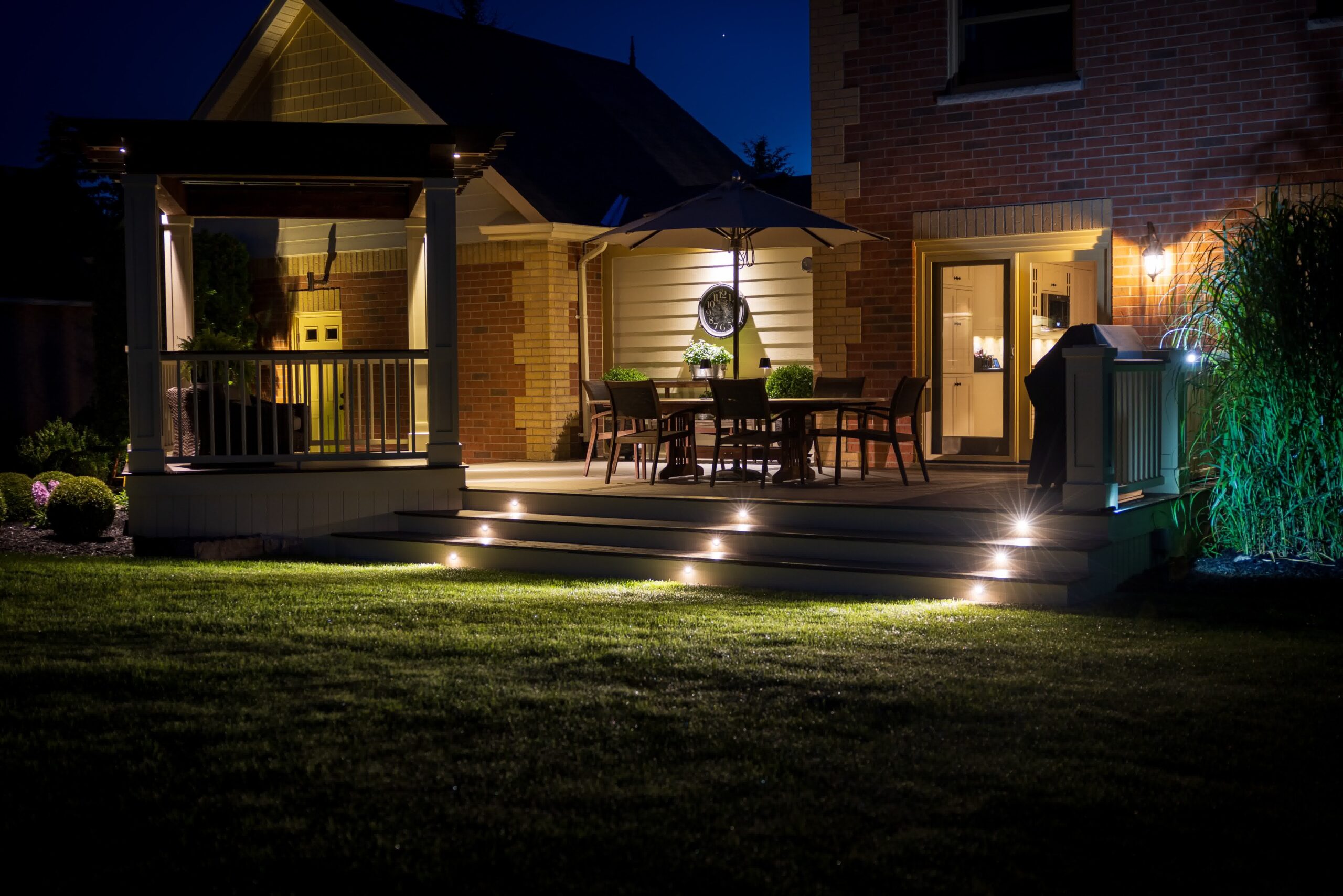 An outdoor patio section with warm lighting to aid sight and boost aesthetics.