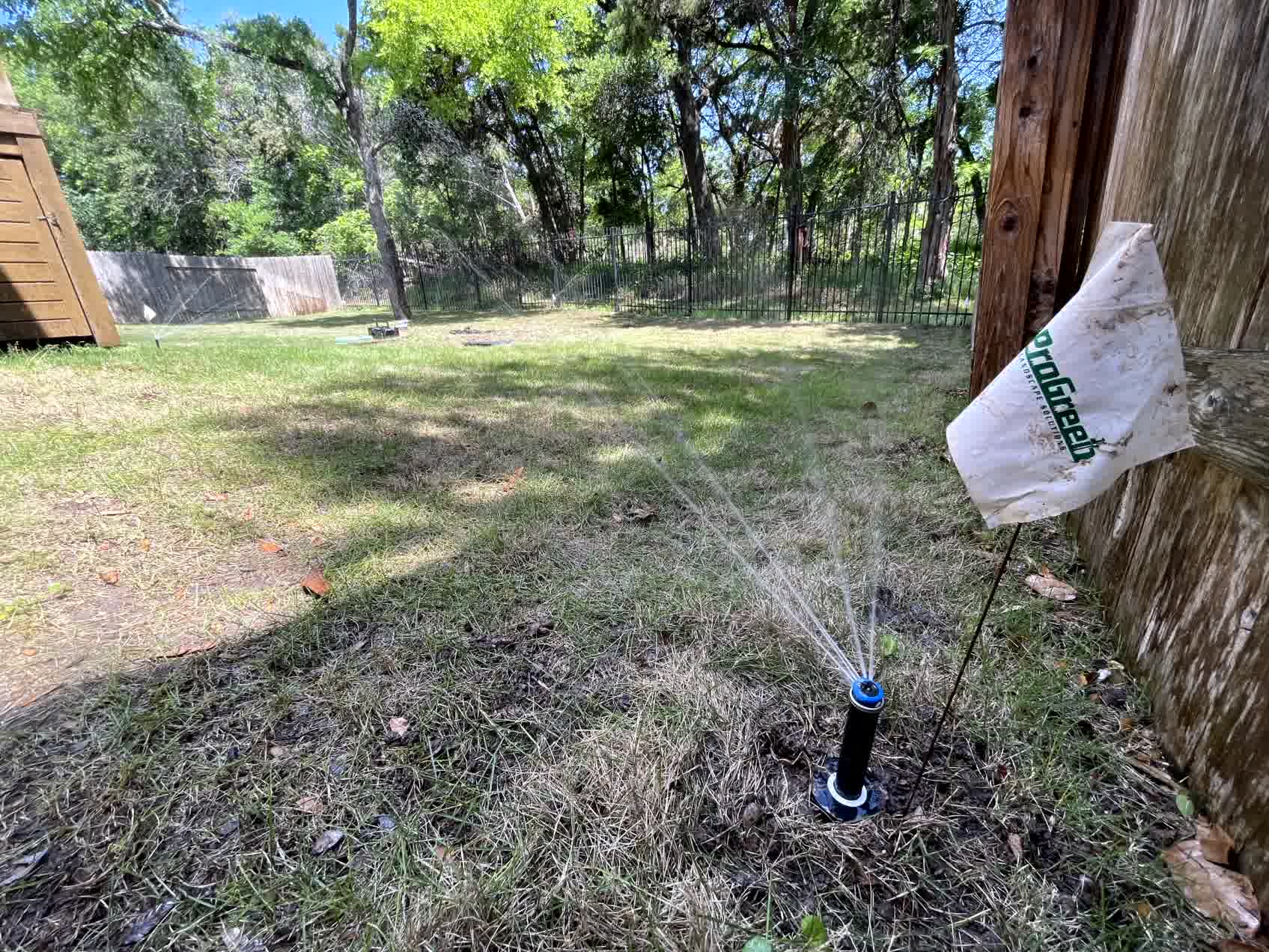 A sprinkler head working properly after a professional irrigation inspection.